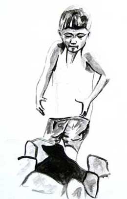 Junge schleppt Steine